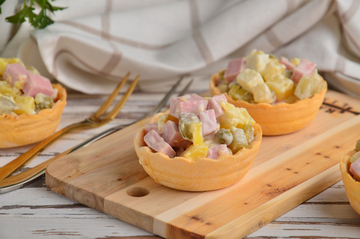Olivier in tartlets - an original appetizer from the famous salad