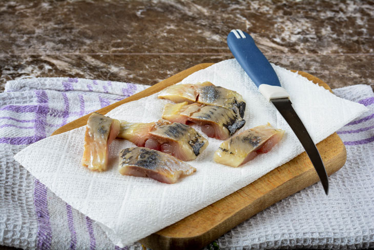 Canape with herring - a beautiful and appetizing appetizer for the holiday