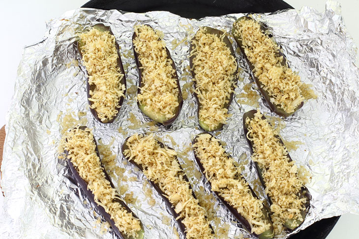 Eggplant baked in the oven with cheese - soft and juicy with a crispy crust