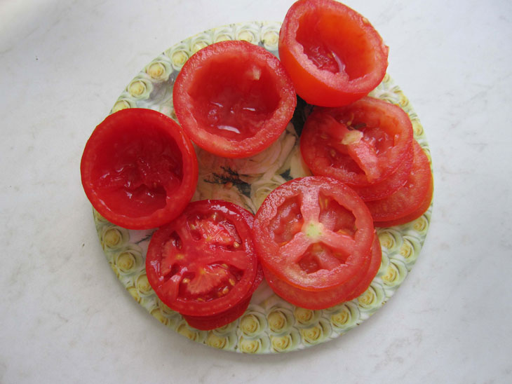 Beautiful appetizer of tomatoes with cottage cheese from a simple set of products