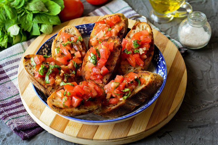 Bruschetta with tomatoes, garlic and basil - beautiful and tasty