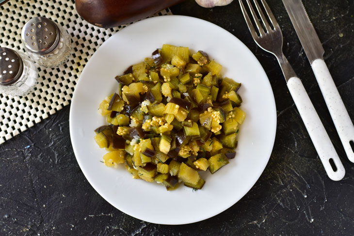 Pickled eggplants with garlic and herbs - will quickly scatter from the family table