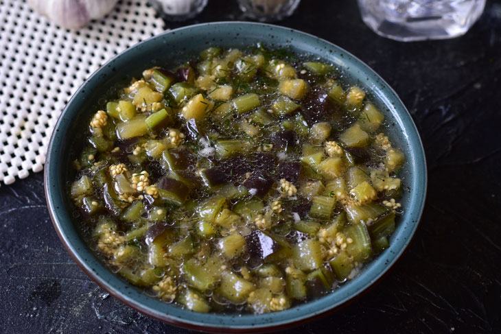 Pickled eggplants with garlic and herbs - will quickly scatter from the family table