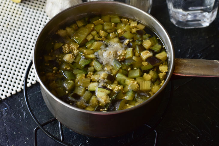 Pickled eggplants with garlic and herbs - will quickly scatter from the family table