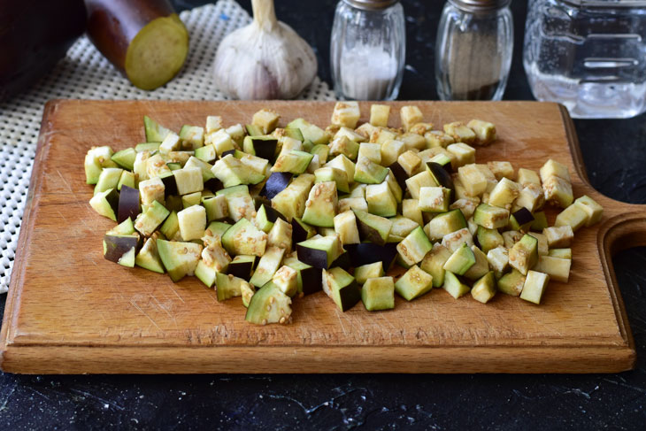 Pickled eggplants with garlic and herbs - will quickly scatter from the family table