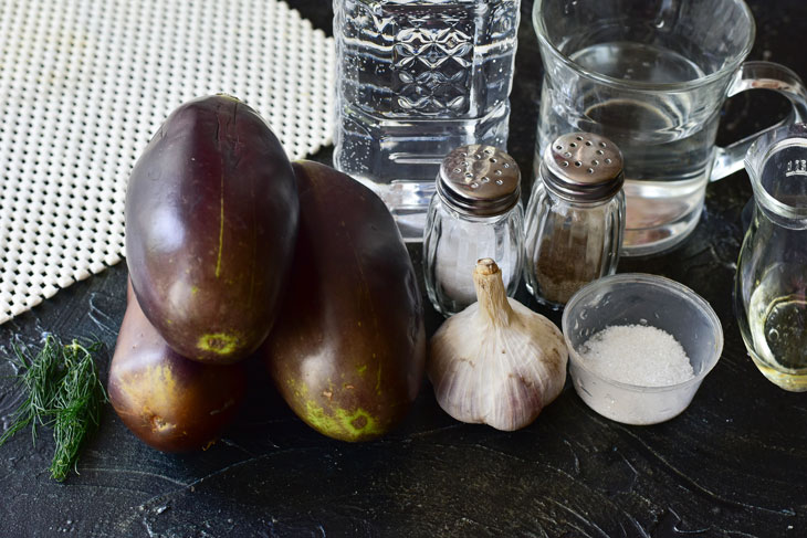 Pickled eggplants with garlic and herbs - will quickly scatter from the family table