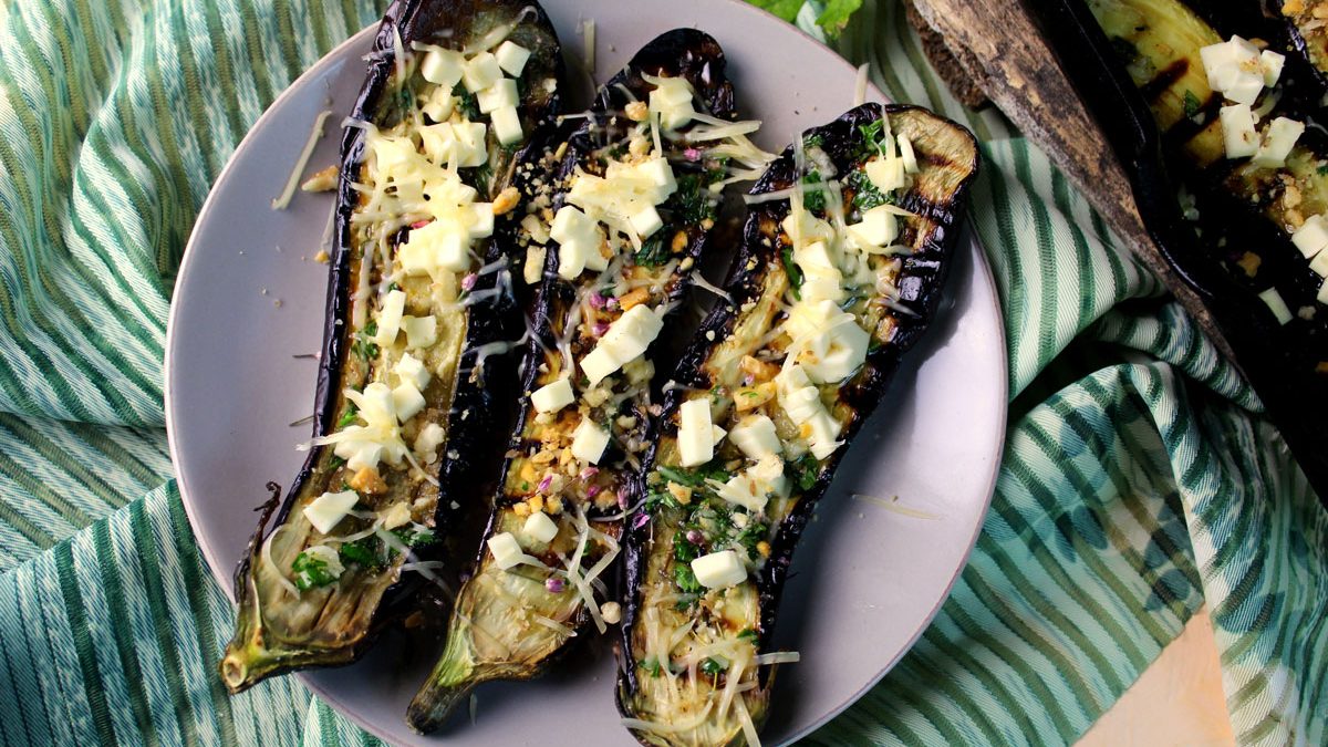 Delicious grilled eggplant with cheese and nuts