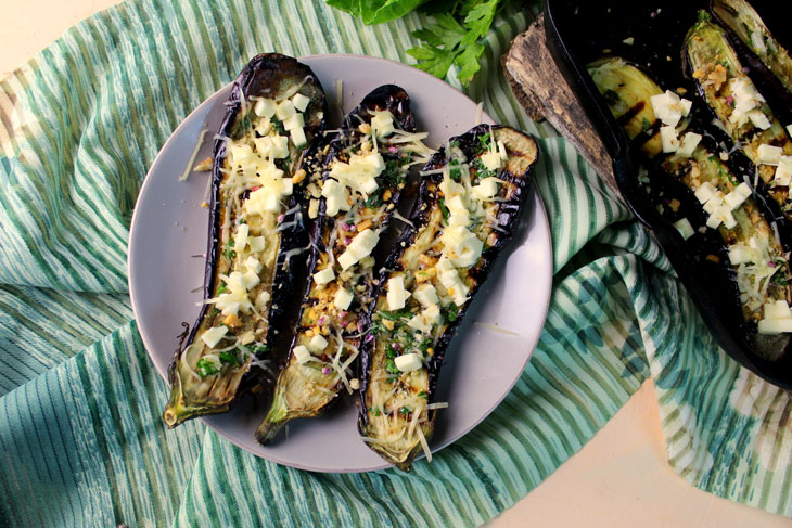 Delicious grilled eggplant with cheese and nuts