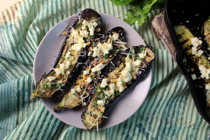 Delicious grilled eggplant with cheese and nuts