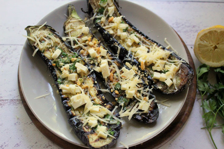 Delicious grilled eggplant with cheese and nuts