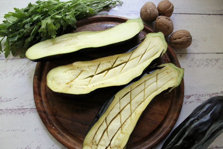 Delicious grilled eggplant with cheese and nuts