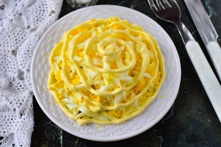 Very tender salad with sprats and butter