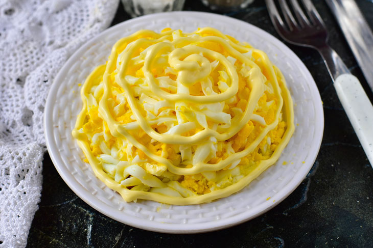 Very tender salad with sprats and butter