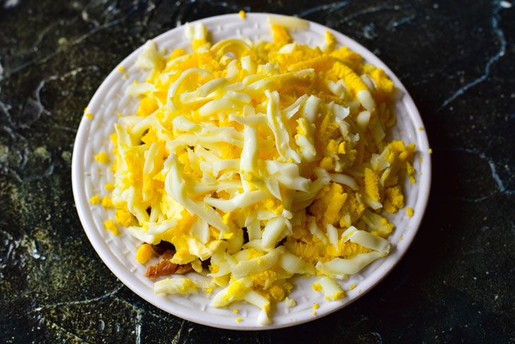 Very tender salad with sprats and butter