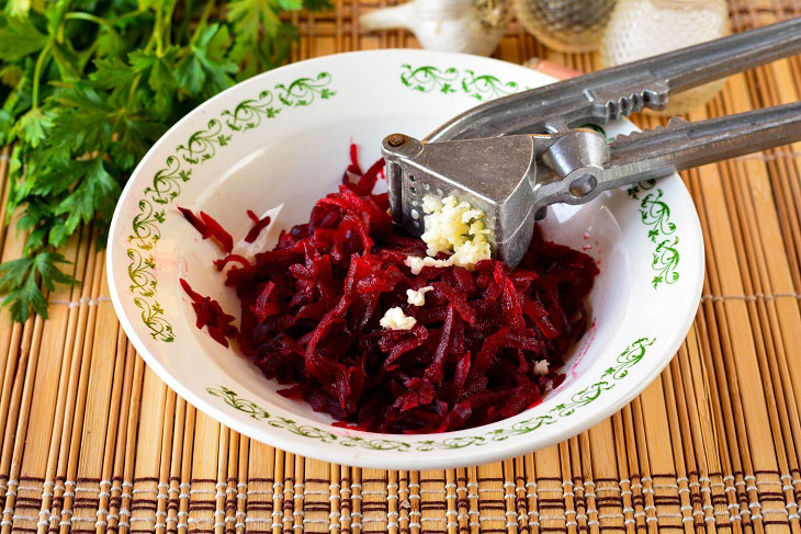 Delicious and spicy salad with beets - guests will definitely ask for more