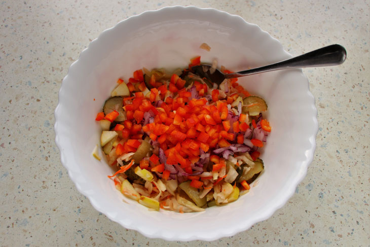 Winter salad with chicken, sauerkraut and apple