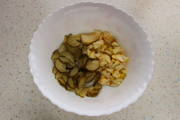 Winter salad with chicken, sauerkraut and apple