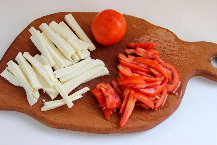 Eggplant salad with tomatoes and Adyghe cheese