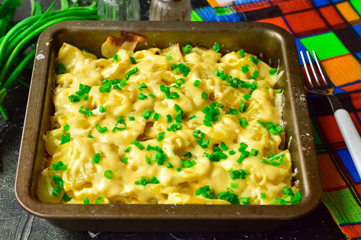 Festive potatoes with meat in the oven - tasty, elegant and simple