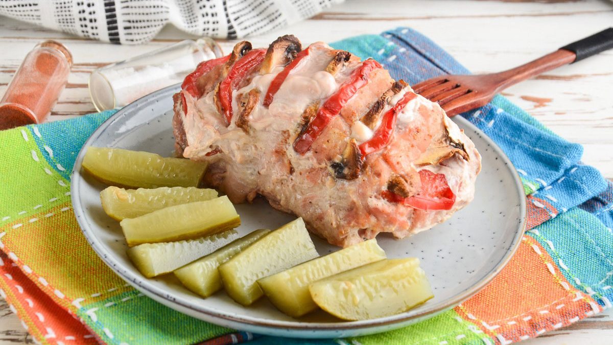 Meat “Accordion” with champignons in the oven – ideal for a festive feast