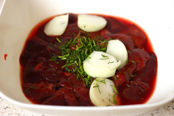 Liver cake with sour cream and hard cheese