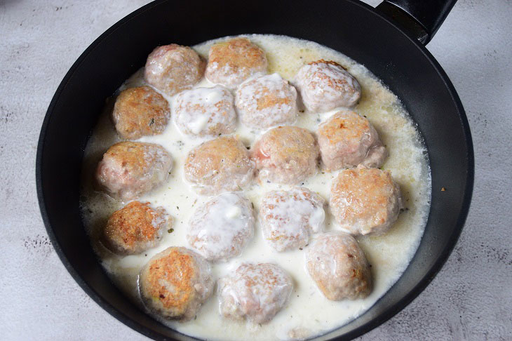 Meatballs in sour cream sauce in a pan - this is one of the easiest dishes