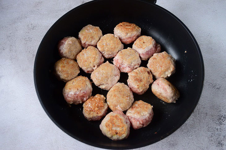 Meatballs in sour cream sauce in a pan - this is one of the easiest dishes