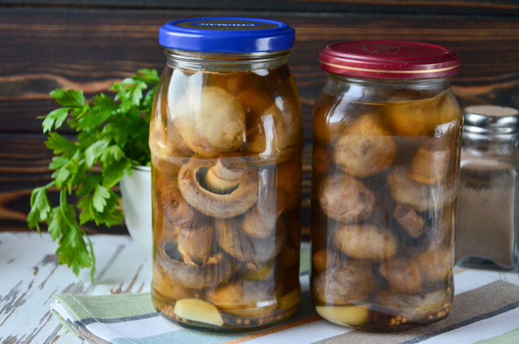 Whole champignons marinated for the winter - impossible to break away