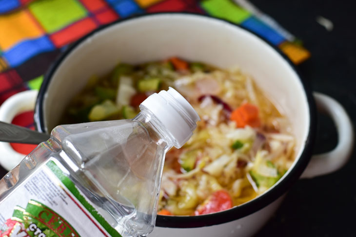 Salad "Hunter" with cabbage in jars for the winter - simply and quickly