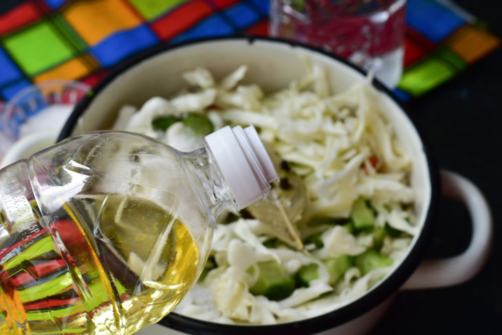 Salad "Hunter" with cabbage in jars for the winter - simply and quickly