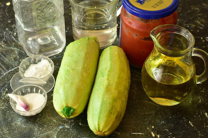 Zucchini with tomato paste for the winter - a versatile vegetable snack