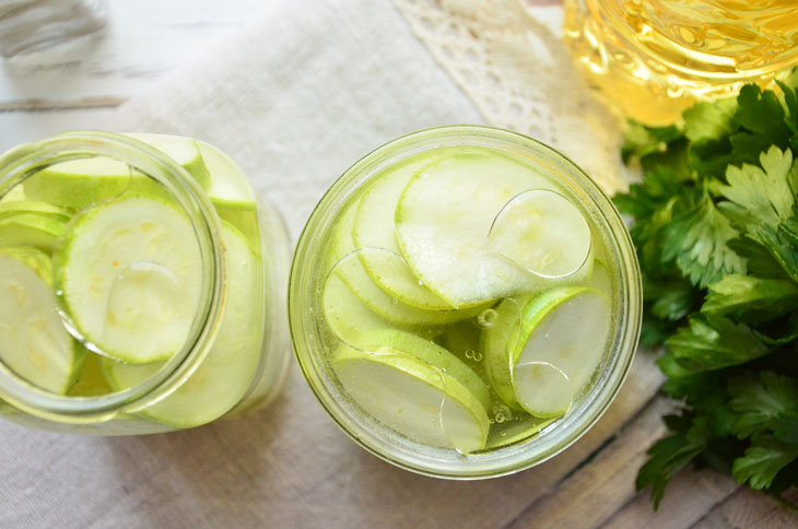 Zucchini marinated for the winter with sterilization - a step by step recipe with a photo