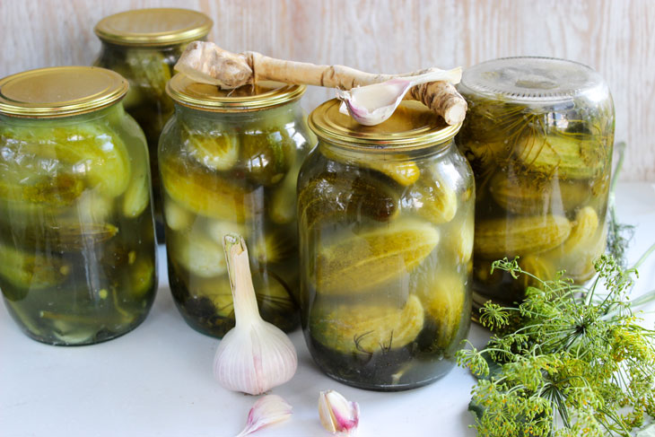 Pickled cucumbers for the winter in liter jars - crispy, like barrel