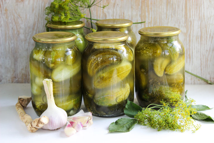 Pickled cucumbers for the winter in liter jars - crispy, like barrel