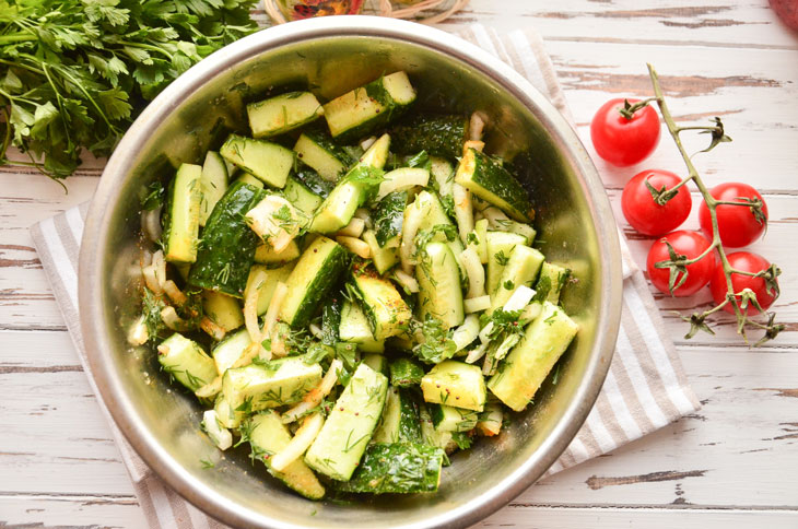 Spicy cucumber salad for the winter: a step by step recipe with a photo