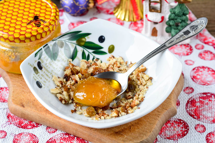 Baked apples with raisins and honey - a light and tasty dessert for the Christmas table