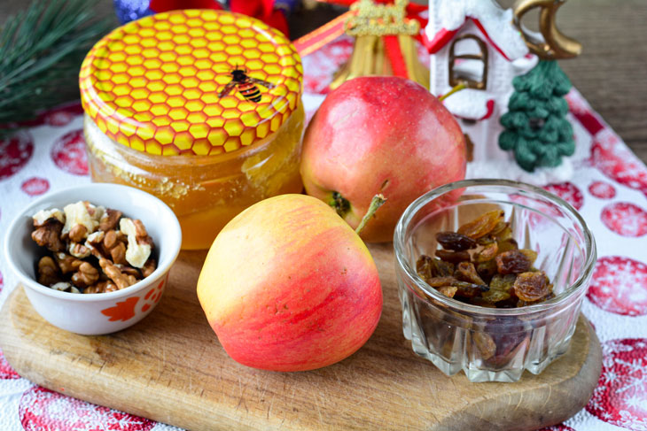 Baked apples with raisins and honey - a light and tasty dessert for the Christmas table