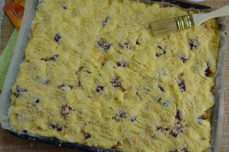 Homemade shortbread pie with apples and cherries - very tasty and fragrant