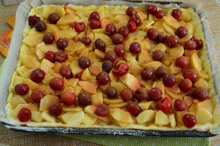 Homemade shortbread pie with apples and cherries - very tasty and fragrant