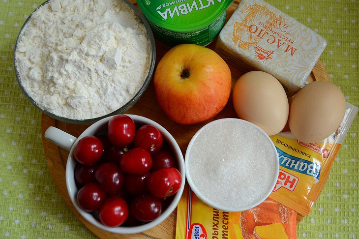 Homemade shortbread pie with apples and cherries - very tasty and fragrant