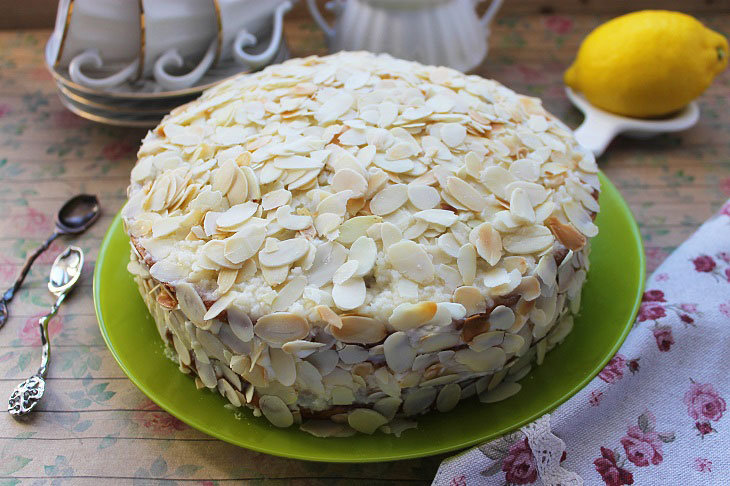 Cake "Honey" with almond petals - festive and delicious