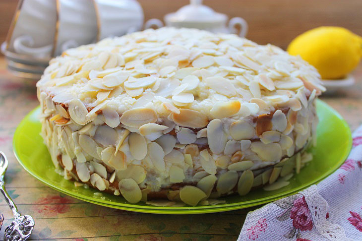 Cake "Honey" with almond petals - festive and delicious
